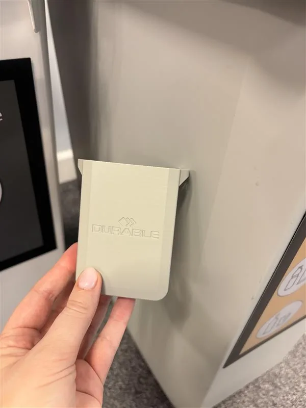 Close up of a 3D printed mini DURABIN with the DURABLE logo embossed into the body