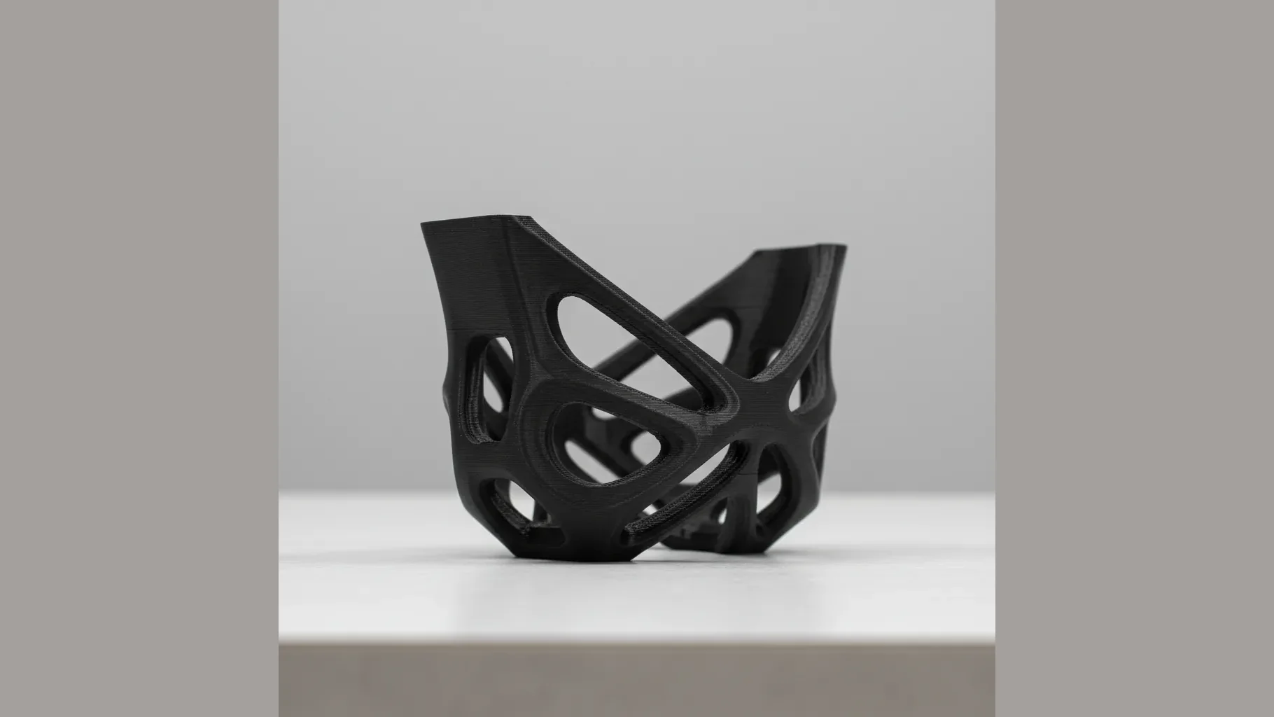 A 3D-printed PA612-ESD topology-optimised lightweight bracket