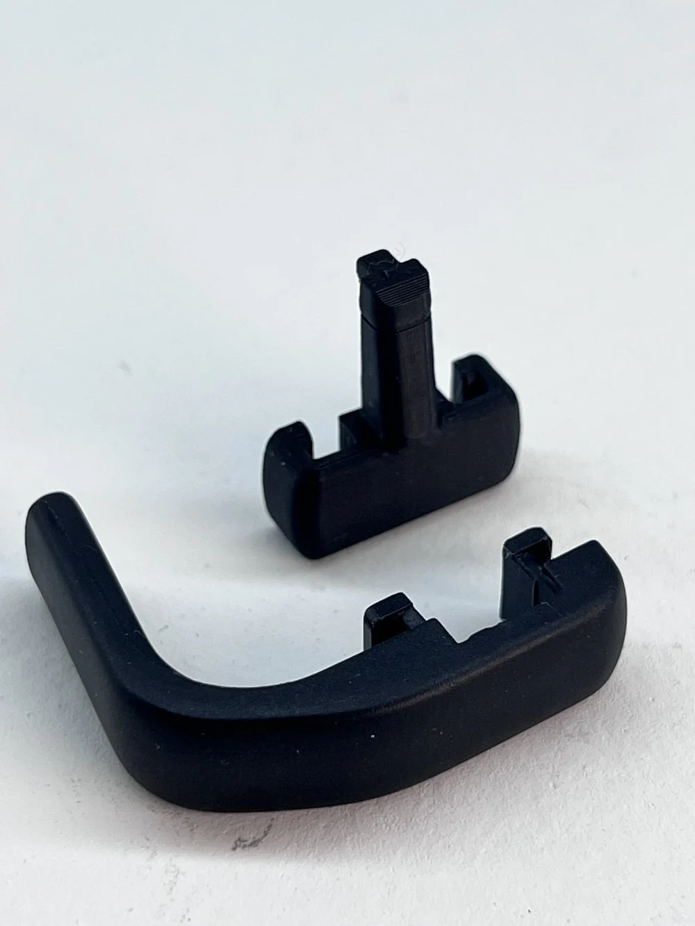 3D Printing Express matt-black PA12-nylon reproductions of the Maserati interior trim clips