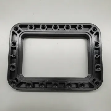3DPE matt-black ABS reproduction of the pool skimmer front plate on a workshop bench