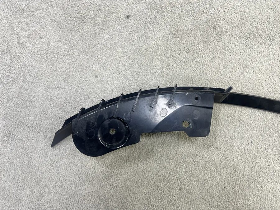 A Citroen Berlingo interior trim piece on the floor, the left-hand original a right-hand mirror trim would be copied from